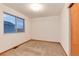 This bedroom has natural light with a neutral carpet at 10233 Silver Maple Cir, Highlands Ranch, CO 80129