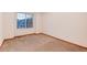 This bedroom has natural light with a neutral carpet at 10233 Silver Maple Cir, Highlands Ranch, CO 80129