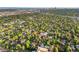 Beautiful aerial view of the neighborhood and city beyond showing lush landscaping at 1815 S Ogden St, Denver, CO 80210