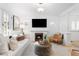 Inviting living room with fireplace and comfortable seating creating a warm atmosphere at 1815 S Ogden St, Denver, CO 80210