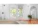 Bedroom featuring french doors to a balcony and decorative floor mirror at 1815 S Ogden St, Denver, CO 80210