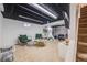 Spacious basement area with finished ceilings and an area for activities at 2773 S Macon St, Aurora, CO 80014