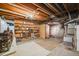 Unfinished basement provides ample storage and shelving options at 2773 S Macon St, Aurora, CO 80014