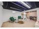 Finished basement features a large play area and exposed ceiling at 2773 S Macon St, Aurora, CO 80014