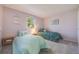 Bedroom with two beds, colorful décor, and a sunny window at 2773 S Macon St, Aurora, CO 80014