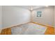 Bright bedroom with hardwood floors and natural light from a large window at 2773 S Macon St, Aurora, CO 80014
