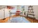 Bright home office offers a large window with natural light and ample desk space at 2773 S Macon St, Aurora, CO 80014