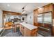Bright kitchen features stainless steel appliances and an open layout to the living room at 2773 S Macon St, Aurora, CO 80014