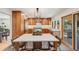 Bright kitchen features a breakfast bar island, modern lighting, and stainless steel appliances at 2773 S Macon St, Aurora, CO 80014