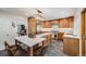 Bright kitchen with breakfast bar, stainless appliances, and an open layout at 2773 S Macon St, Aurora, CO 80014