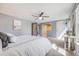 Spacious main bedroom features neutral paint, ceiling fan and cozy carpet at 2773 S Macon St, Aurora, CO 80014