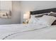 Up close shot of the main bedroom highlighting the pillows and comforter at 2773 S Macon St, Aurora, CO 80014