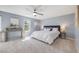Serene primary bedroom with a calming color scheme and a ceiling fan at 2773 S Macon St, Aurora, CO 80014