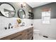 Stylish bathroom with double sinks, modern fixtures, and ample counter space for comfortable routines at 10286 Rotherwood Cir, Highlands Ranch, CO 80130