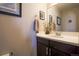 This bathroom features a dark vanity with a white countertop and a neutral color scheme at 2044 N High St, Denver, CO 80205
