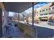 Cozy covered patio area with seating, perfect for relaxing outdoors at 2044 N High St, Denver, CO 80205