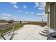 Spacious backyard featuring a concrete patio, grill, and comfortable hammock setup at 2201 Monte Vista St, Fort Lupton, CO 80621