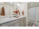 Bright bathroom with dual sinks, neutral color palette, and access to the toilet and shower at 2201 Monte Vista St, Fort Lupton, CO 80621