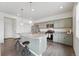 Kitchen with granite countertops, stainless steel appliances, and kitchen island seating at 2201 Monte Vista St, Fort Lupton, CO 80621