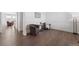 Elegant living room featuring modern decor and hardwood floors with stylish seating area at 2201 Monte Vista St, Fort Lupton, CO 80621