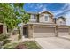 Charming two-story townhome with a two-car garage and stone accents at 5957 Turnstone Pl, Castle Rock, CO 80104