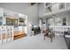 Open-concept living room showcasing a multi-level layout with access to the kitchen and upper floors at 5531 S Telluride Ct, Centennial, CO 80015