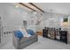 Spacious living area featuring a vaulted ceiling, hardwood floors, and a cozy seating arrangement at 5531 S Telluride Ct, Centennial, CO 80015