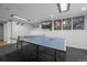Basement recreation room with TV and ping pong table at 5531 S Telluride Ct, Centennial, CO 80015