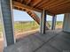 Covered patio with concrete flooring and a view of the open backyard at 8326 Cokedale Cir, Littleton, CO 80125