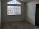 Cozy bedroom with a window overlooking the neighborhood and a sliding door closet at 4760 S Wadsworth # 301, Littleton, CO 80123