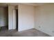 Neutral bedroom featuring carpet, an open closet and painted walls at 4760 S Wadsworth # 301, Littleton, CO 80123