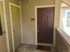 Condo front door with sidelight, exterior closet, and unit number F-301 at 4760 S Wadsworth # 301, Littleton, CO 80123