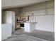 Open-concept living space with a view of the kitchen at 4760 S Wadsworth # 301, Littleton, CO 80123