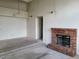 Carpeted living area featuring a brick fireplace at 4760 S Wadsworth # 301, Littleton, CO 80123