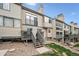 View of townhouse featuring a back deck at 7450 W Coal Mine Ave # D, Littleton, CO 80123