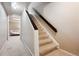 Carpeted stairs leading to the living areas at 7450 W Coal Mine Ave # D, Littleton, CO 80123
