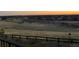 View of the backyard and surrounding neighborhood over a black wooden fence at 8784 S Riviera Ct, Aurora, CO 80016