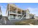Multi-level outdoor living space featuring backyard with patio and stairs at 8784 S Riviera Ct, Aurora, CO 80016