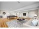 Finished basement with a pool table, living area with couch, and contemporary decorations at 8784 S Riviera Ct, Aurora, CO 80016