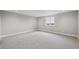 Bright bedroom with neutral carpet, ample natural light and recessed lighting at 8784 S Riviera Ct, Aurora, CO 80016