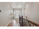 Bright entryway features a hardwood floor, neutral colors, and natural light at 8784 S Riviera Ct, Aurora, CO 80016