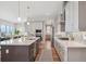 Bright and spacious kitchen with a large center island and stainless steel appliances at 8784 S Riviera Ct, Aurora, CO 80016