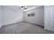 Bedroom with neutral carpet and a ceiling fan at 3806 S Yosemite St, Denver, CO 80237