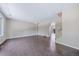 Spacious living area with hardwood floors, neutral walls, and abundant natural light at 3806 S Yosemite St, Denver, CO 80237