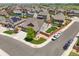 Aerial view of a home with a well-manicured yard, and a fenced backyard in a residential neighborhood at 15804 Elizabeth E Cir, Thornton, CO 80602