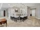 Stylish basement bar featuring pendant lighting, seating, and a modern design at 15804 Elizabeth E Cir, Thornton, CO 80602