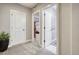 Hallway with access to bedrooms, bathroom, and closet space at 15804 Elizabeth E Cir, Thornton, CO 80602
