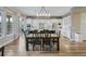 Spacious eat-in kitchen featuring an island, stainless steel appliances, and dining table at 15804 Elizabeth E Cir, Thornton, CO 80602