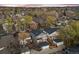 A vibrant neighborhood view showcases craftsman style houses in a quiet residential community at 2475 S Adams St, Denver, CO 80210