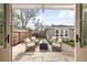 Outdoor patio with a fire pit and comfortable seating perfect for entertaining at 2475 S Adams St, Denver, CO 80210